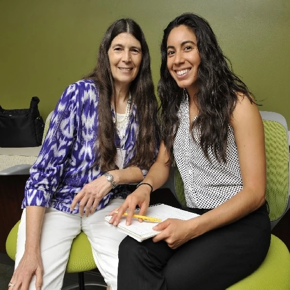 A matched pair of a mentor and a mentee meet at an AADC Mentorship Event